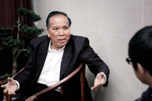 陈开枝:21年百次赴老区扶贫